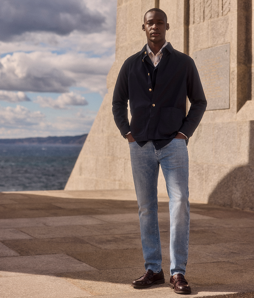 Pants Man in jeans at the harbour